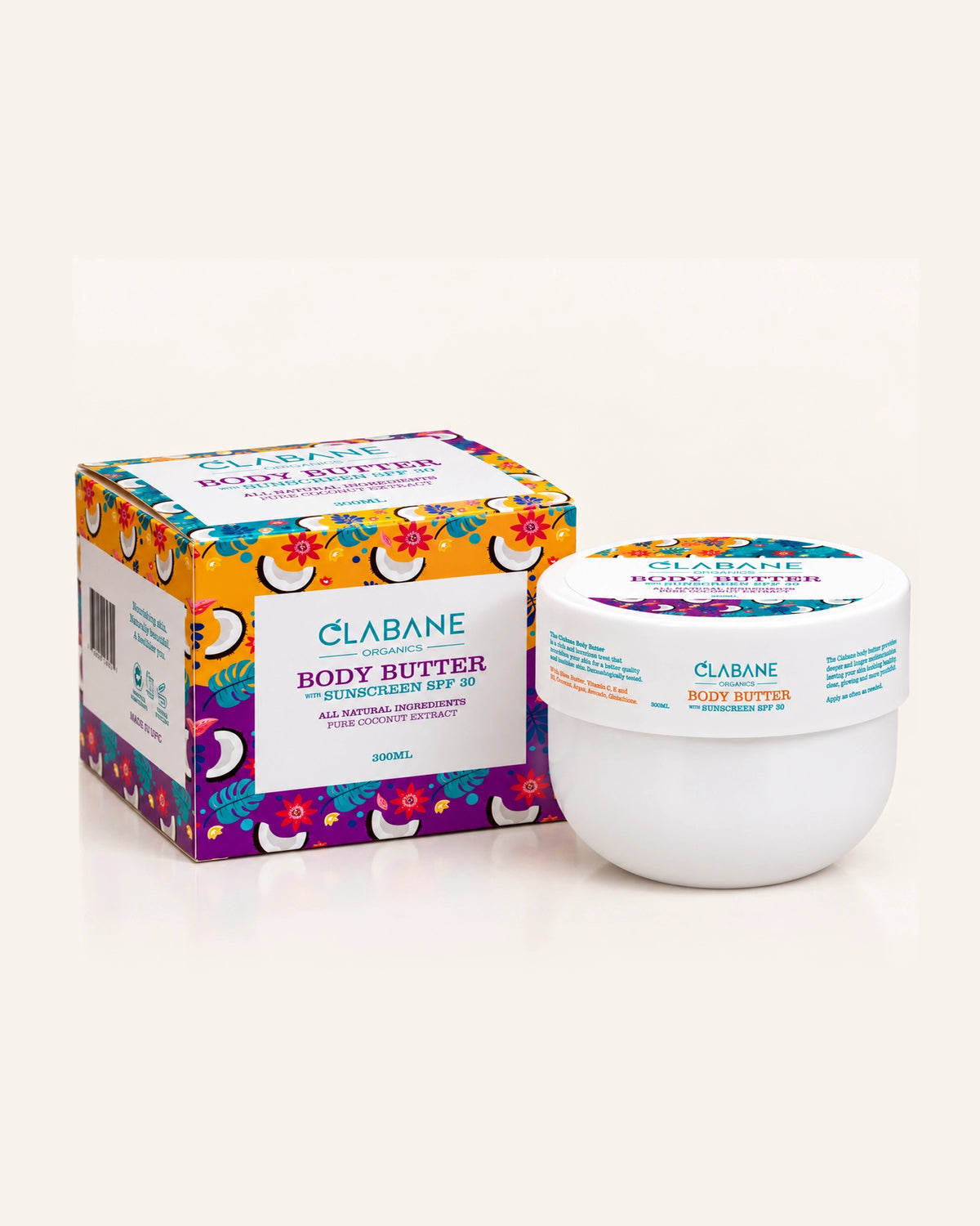 A jar of Clabane Body Butter next to its colorful tropical-patterned box on a clean, light beige background.