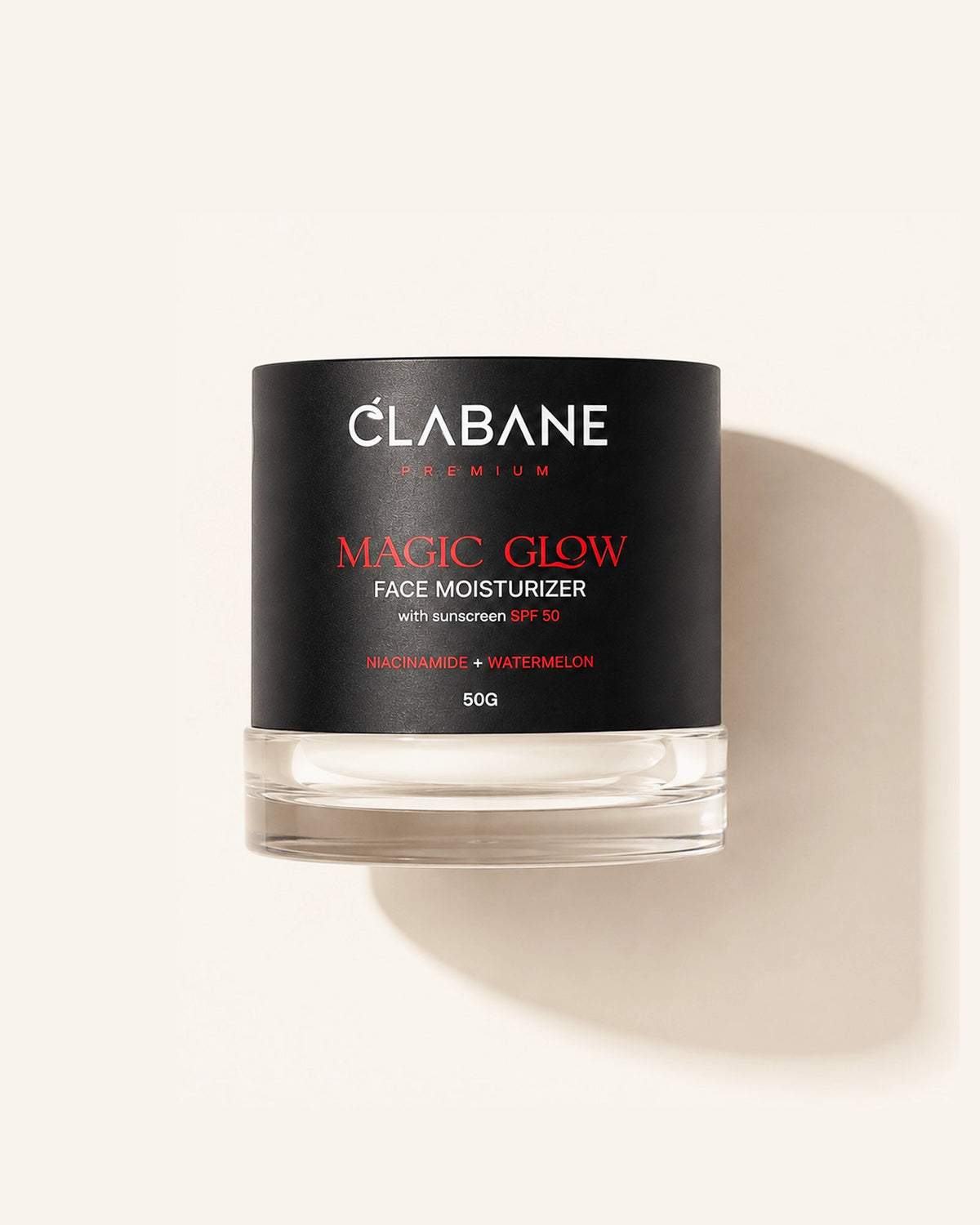 A jar of Clabane Premium Magic Glow Face Moisturizer with SPF 30, featuring a black label with white and red text, set against a warm off-white background with a soft shadow.