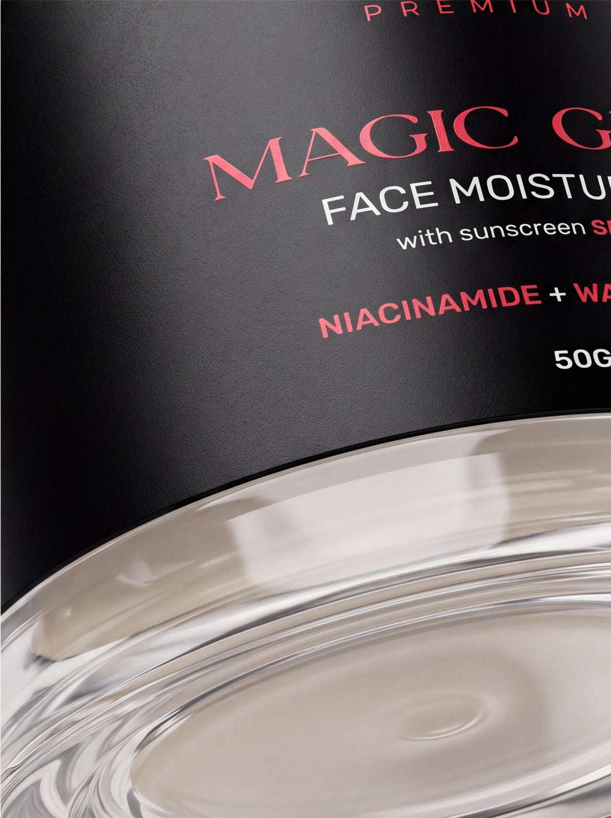 Close-up of a black skincare bottle Clabane Premium Magic Glow face moisturiser with SPF50